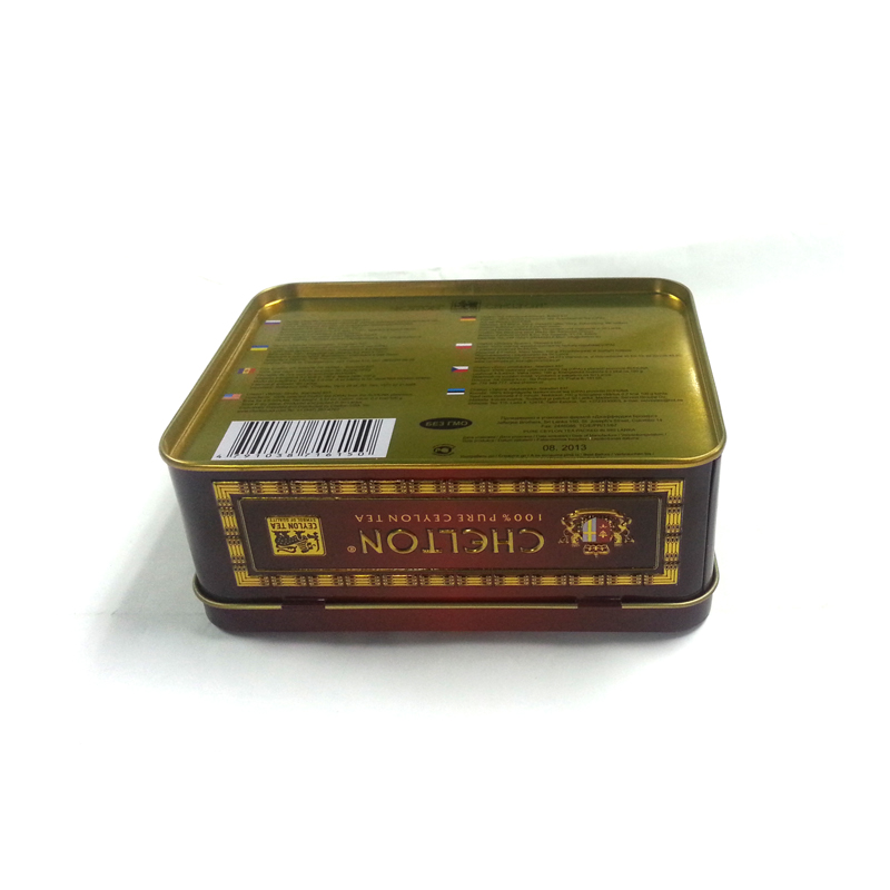 small rectangular metal tea caddy